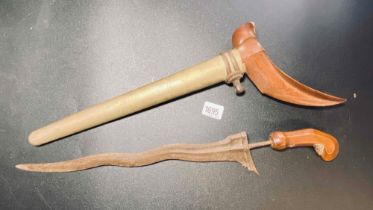 Wooden handled dagger with wavy blade