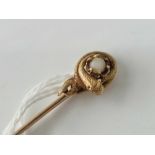 A Victorian gold stick pin with coiled snake around a pearl 3 gms