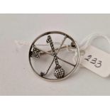 A silver and marcasite hole in one golfing brooch