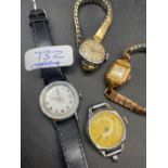 Four assorted wrist watches including TIMEX and INGERSOLL