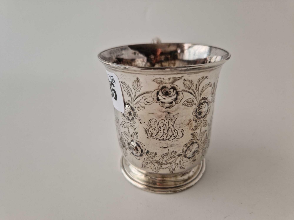 A Victorian Christening mug engraved and chased with flower mottifs,3" high, London 1853 by EB & JB, - Image 2 of 3