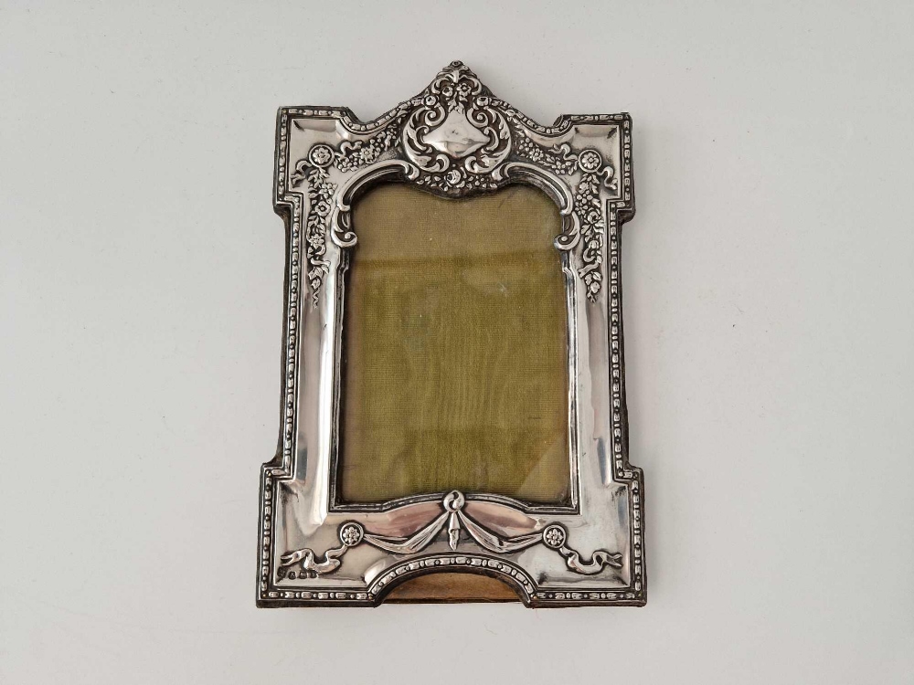 An architectural photo frame with decorated border, 9 inches high, Birmingham 1910 by RP DC