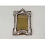 An architectural photo frame with decorated border, 9 inches high, Birmingham 1910 by RP DC