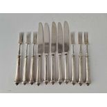 Eleven silver handled fruit knives and forks, Sheffield 1914