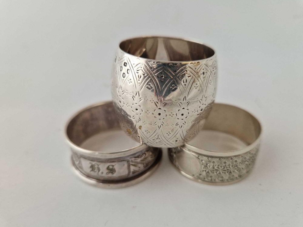 Group of three engraved, fancy napkin rings, London 1885 etc. 55gm - Image 2 of 2