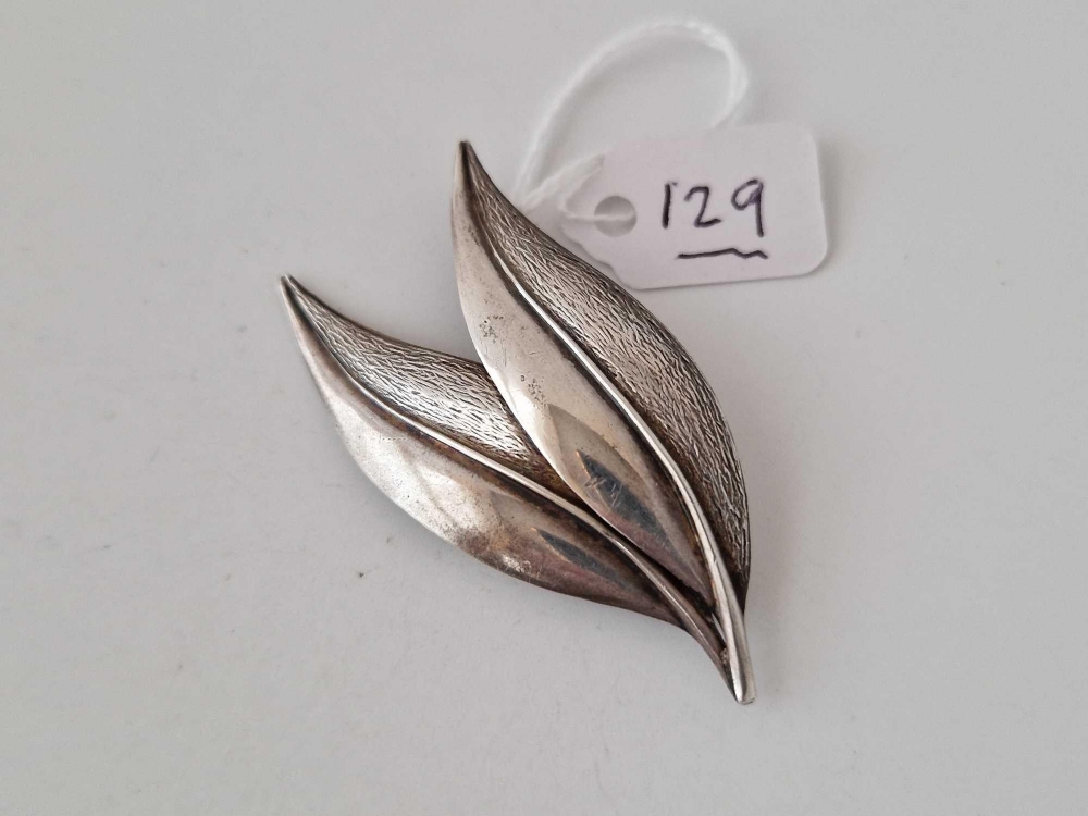 A 1950s silver leaf brooch