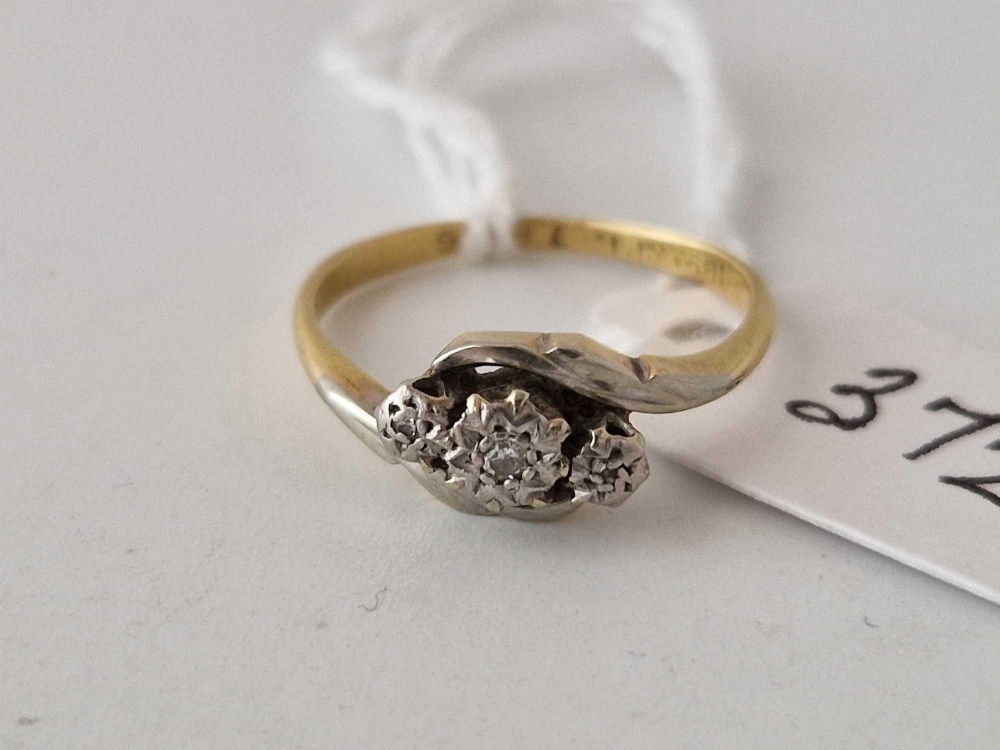 A three stone diamond ring 18ct gold and platinum size M 2.4 gms