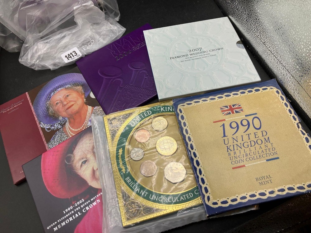 Six cased commemorative coins/sets