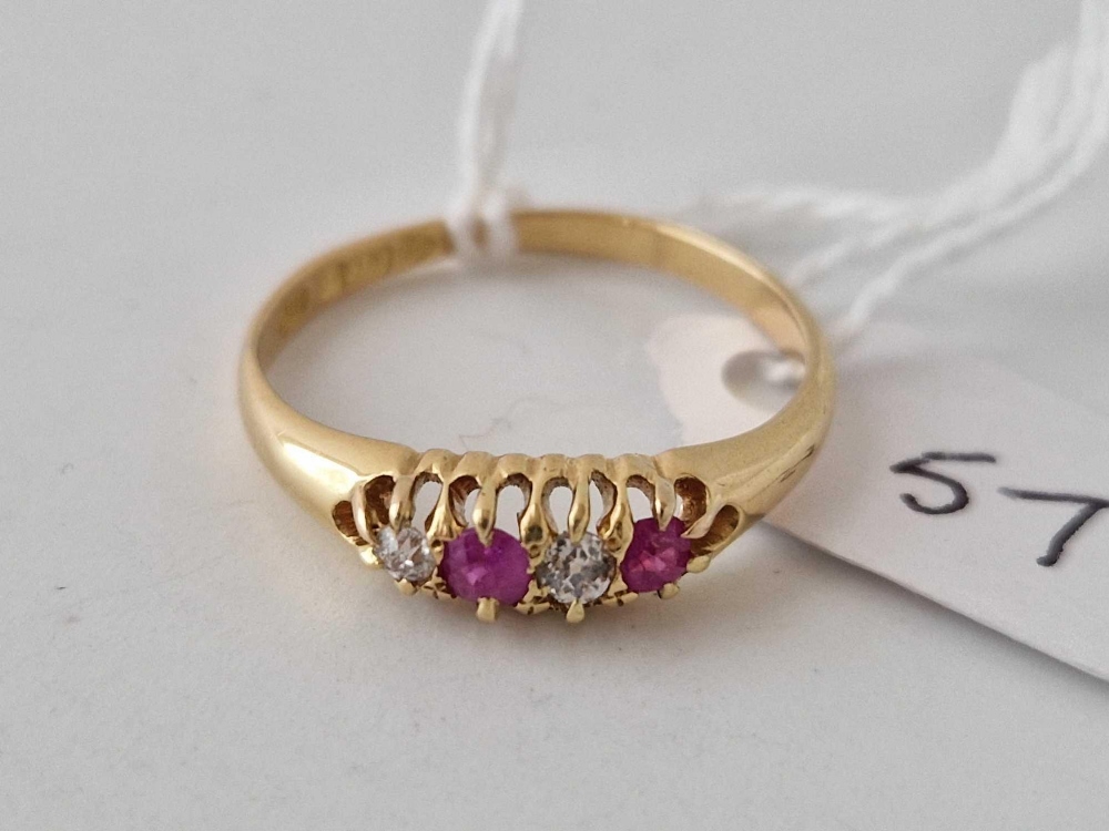 A ruby and diamond four stone ring 18ct gold Chester 1903 size T
