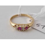 A ruby and diamond four stone ring 18ct gold Chester 1903 size T