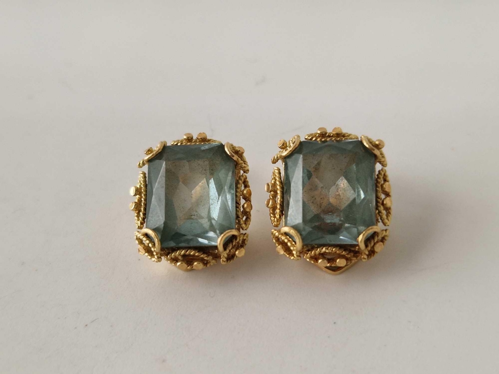 A pair of emerald earrings set in gold 7.7 gms Clip On