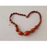A small string of amber beads 15 inch 23.4 gms