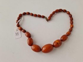 A small string of amber beads 15 inch 23.4 gms