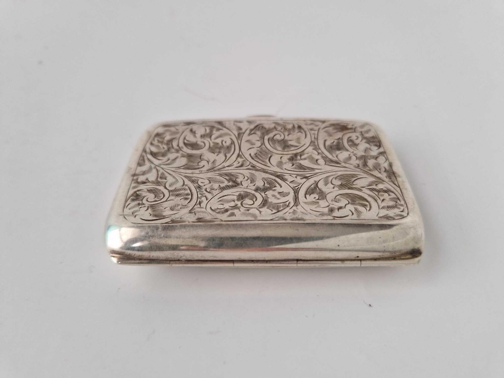 Another cigarette case engraved with scrolls. Birmingham 1930. 46gm - Image 2 of 3