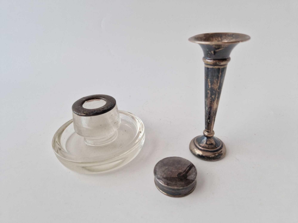 A vase, pill box and a match holder