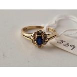 A sapphire and diamond ring 9ct size P 2 gms