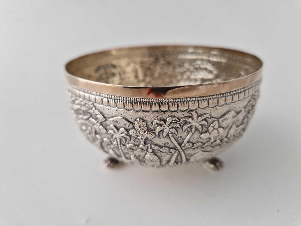 An Indian 95 silver sugar bowl with well chased decoration, by CGK 119 g