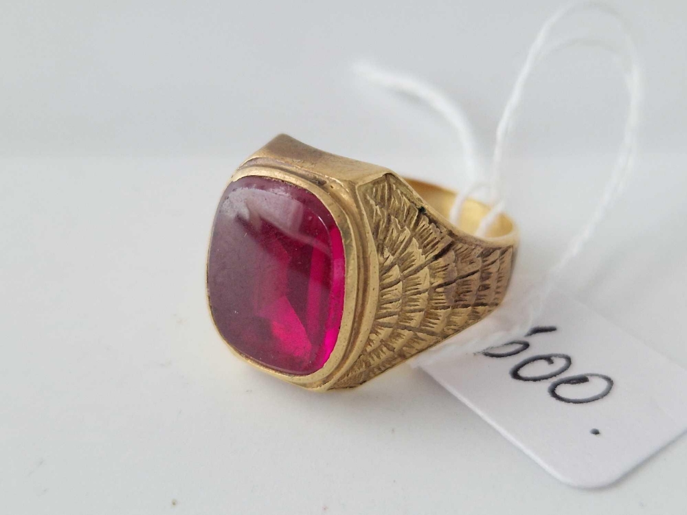 A red stone signet ring set in gold size S 8 gms
