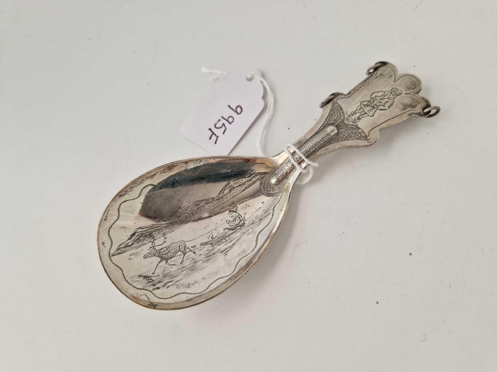 Continental caddy spoon the bowl engraved with a sledging scene. 4.5 in long By G R L