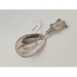 Continental caddy spoon the bowl engraved with a sledging scene. 4.5 in long By G R L