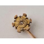 A gold stick pin set with a diamond 2.4 gms