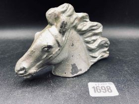 Cast lead car mascot in form of horses head