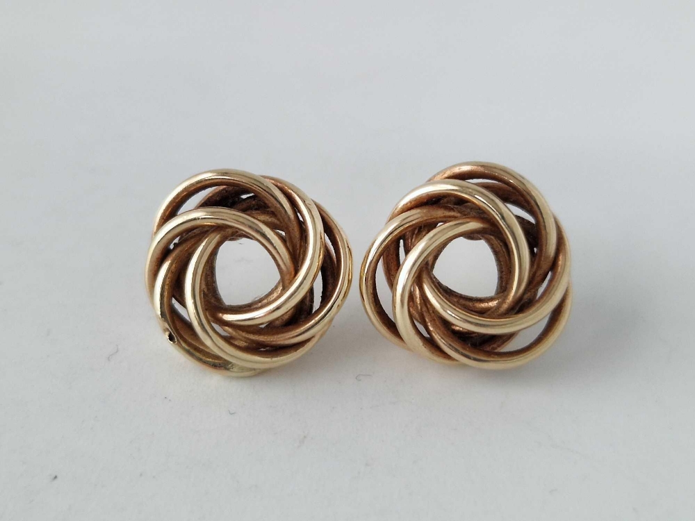 A pair of knot ear studs 9ct 1.3 gms