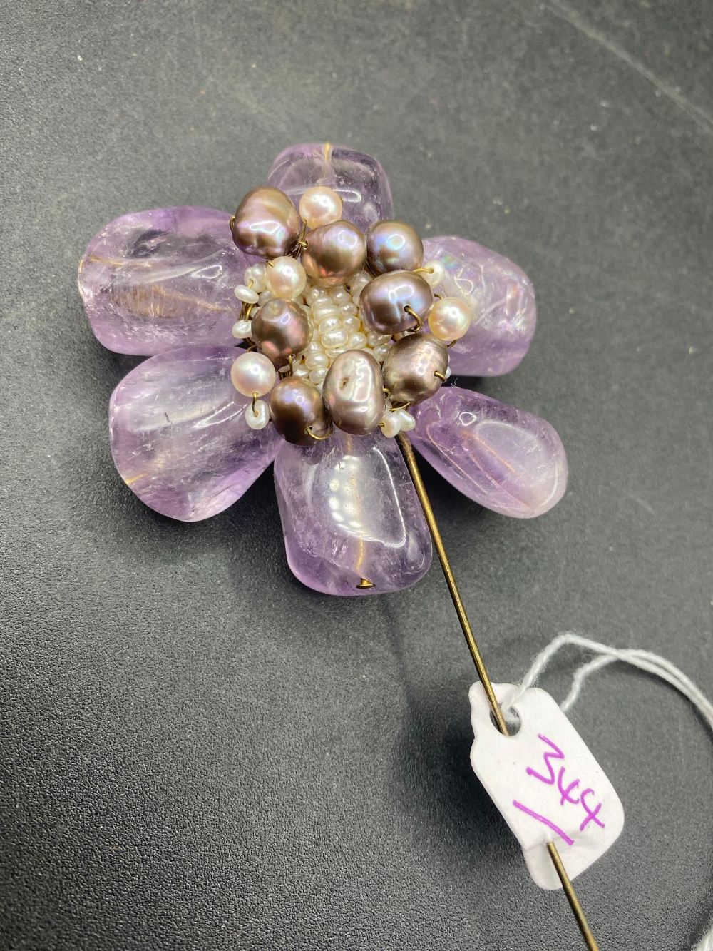 A huge amethyst and multi coloured pearl hand crafted brooch stick pin 200 carats