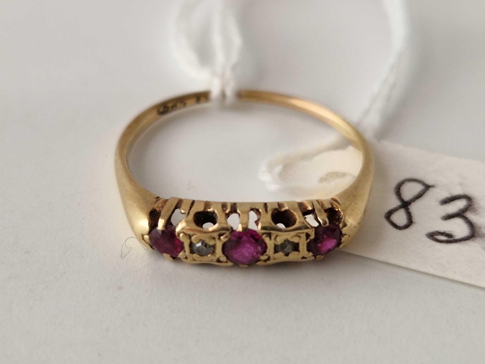 A five stone ruby and diamond ring 18ct gold size S 2.9 gms