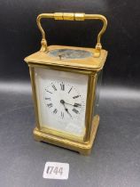 Another brass repeating carriage clock with repeat button and striking bell. 7 in high By Brook