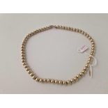 A silver beaded necklace 18 inch 66 gms