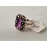 A art deco silver and amethyst cabochon ring size R