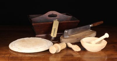 A Oak Cutlery Tray containing Kitchenellea: A sycamore bread board with carved border,
