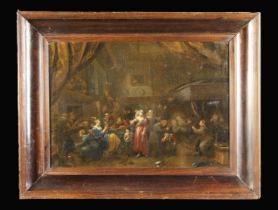 An 18th/Early 19th Century Oil on Canvas: A figural scene set in a dark interior,