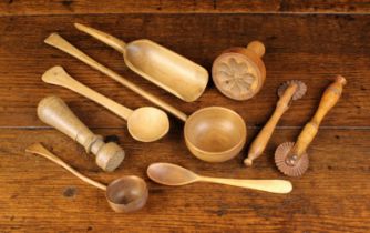 A Group of Small Treen Items: Two 19th century pastry jiggers,