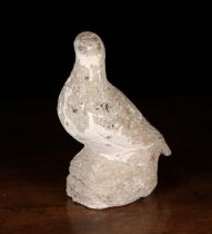 A Stone Carving of a dove 10" (26 cm) high, 4" (10 cm) wide, 8" (20 cm) in length.