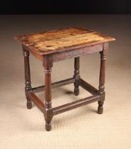 A 17th Century Joined Oak Table or Coffin Stool.