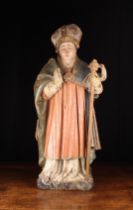 A Late 15th Century Flemish Oak Sculptural Carving of a Bishop with polychrome decoration,