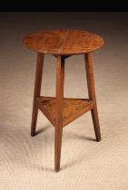 A George III Cricket Table of joined construction.