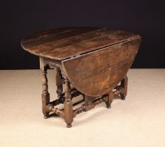 A 17th Century Oak Gateleg Table.