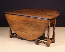 A Large Late 17th Century Oak Gateleg Dining Table.