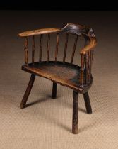 A Primitive 18th Century Ash & Elm Low Stick Back Windsor Armchair.