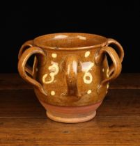 A Halifax Slip-glazed Earthenware Tyg with six handles decorated in cream slip; initialed J.