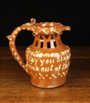 A 19th Century Halifax Slip-ware Puzzle Jug.