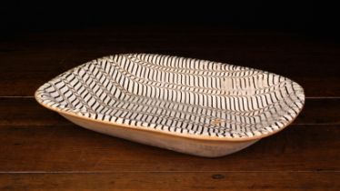A Large 19th Century Slip Glazed Earthenware Dish of rounded oblong form (A/F).