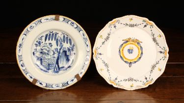 Two Late 18th Century Delft Plates: One with serpentine rim decorated with a pair of hearts in a