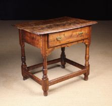 An Early 18th Century Yew-wood Side Table.