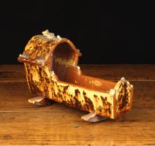 A Small 19th Century Buckley Earthenware Cradle with speckled brown glaze sponged onto a cream