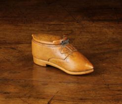 An 18th Century Carved Boxwood Snuff box in the form of a buckled shoe,
