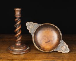 A Large 19th Century Fruitwood Quaich having shaped lug handles either side carved with pelicans,